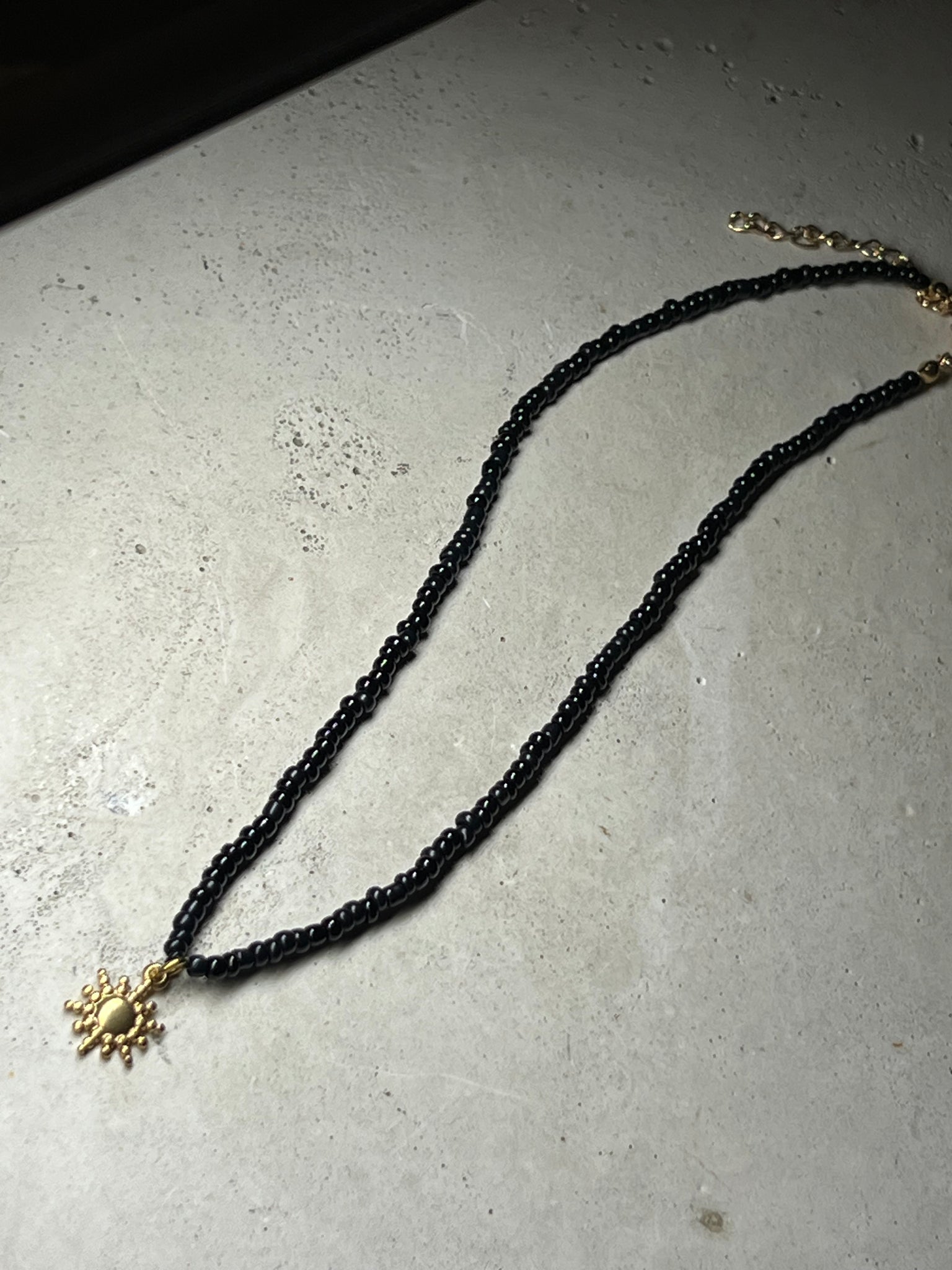 Cutie Perlenkette black Pearls with Sun