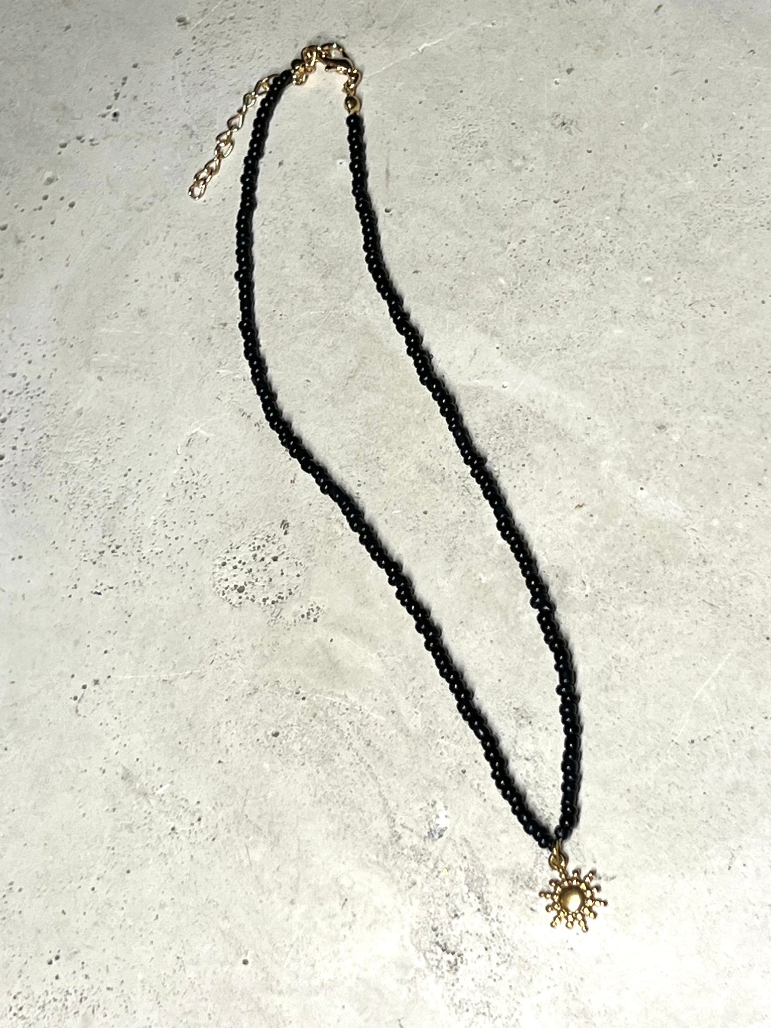 Cutie Perlenkette black Pearls with Sun